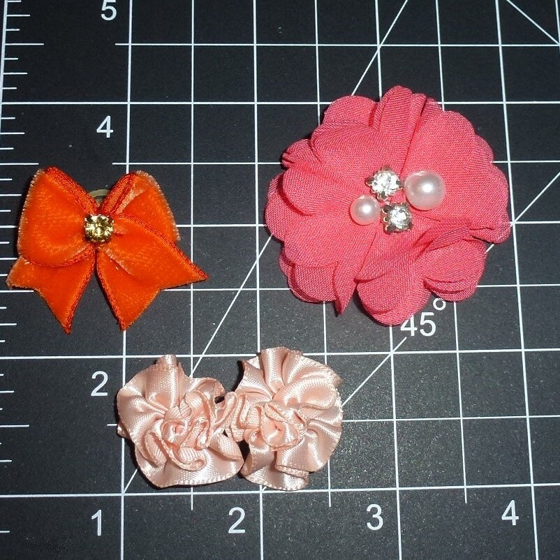 Dog hair mini bows CLEARANCE coral orange bands or barrette clip. (fb501c)