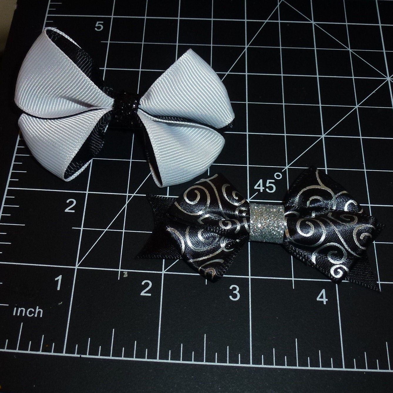 Puppy Bows ~  Set of 2 black and white bow hair barrette or bands (FB465)